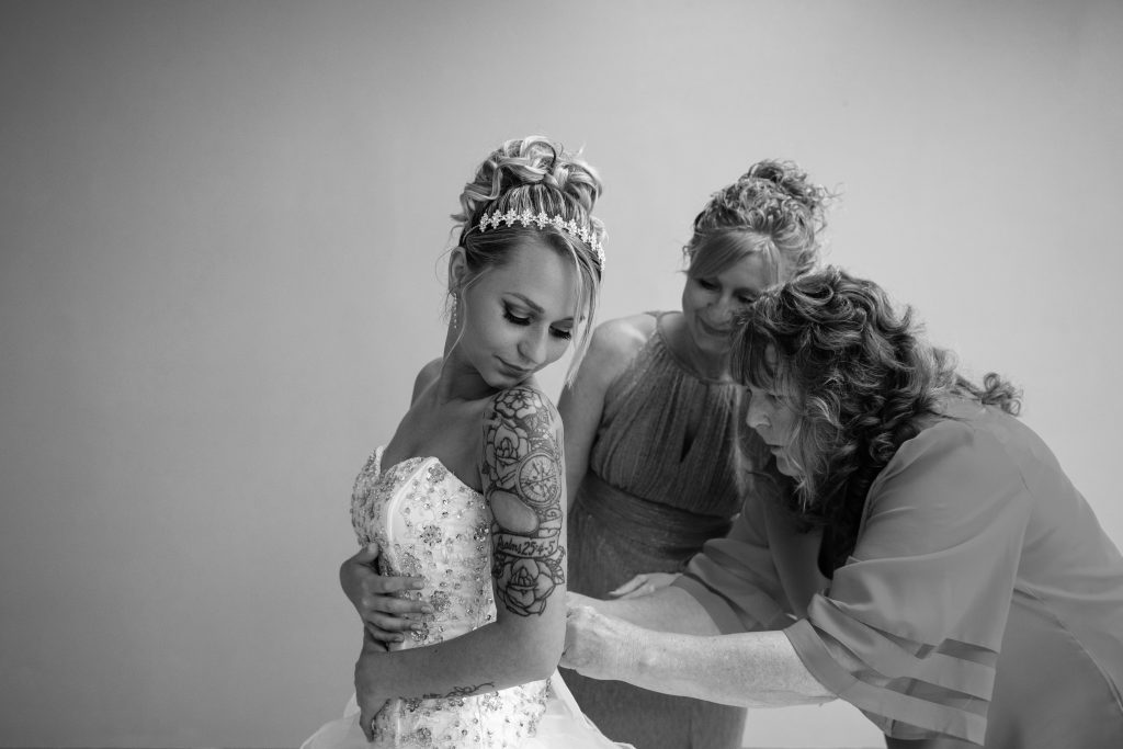 Getting ready photo of bride, mom and grandma 