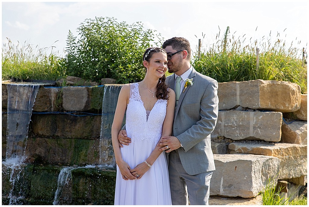 Bride and groom summer wedding at Lakeside Wedding Venue and Event Center