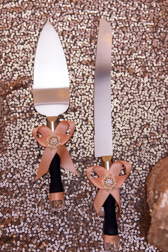 wedding cake knife and server on sparkly fabric