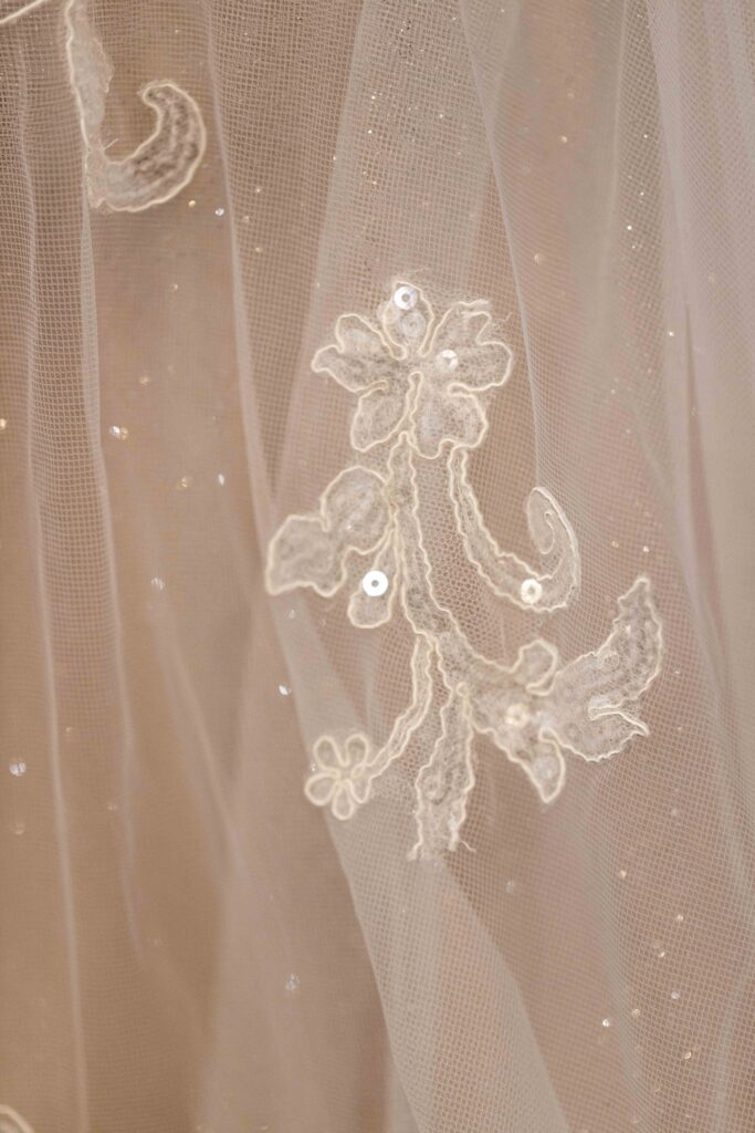 sheer lacy part of wedding dress