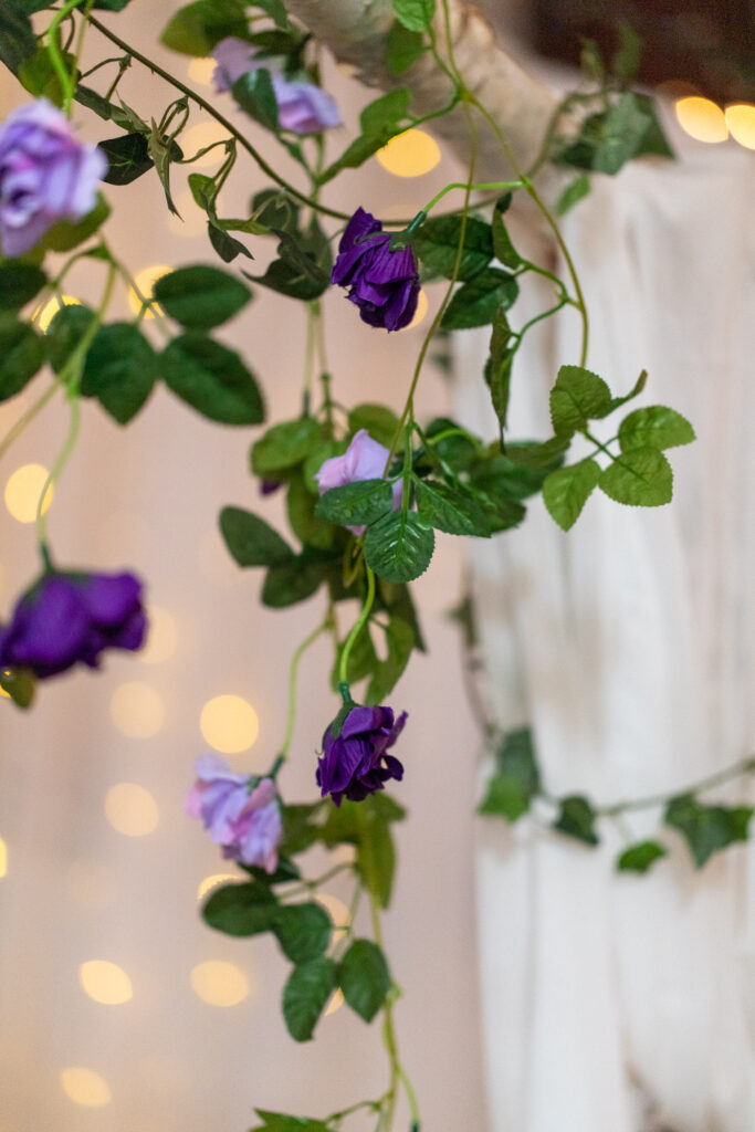 purple flower garland at wedding