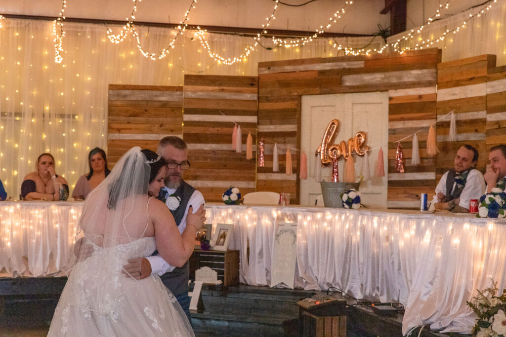 bride and dad dancing at wedding at lakeside wedding venue