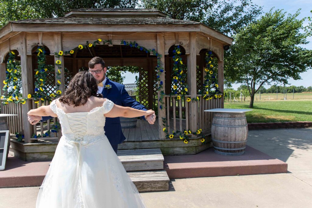 bride and groom in vineyard at summer wedding