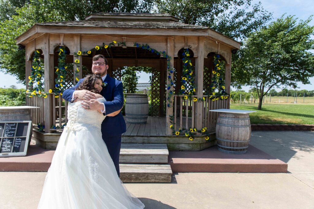 bride and groom in vineyard at summer wedding