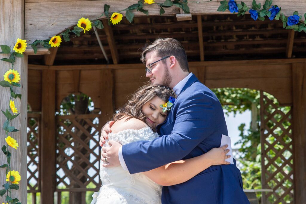 bride and groom in vineyard at summer wedding