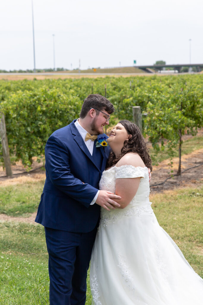 bride and groom in vineyard at summer wedding