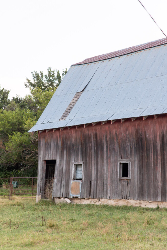 old red barn with metal roof