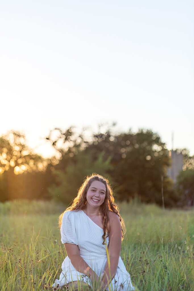 high school senior girl in field photo