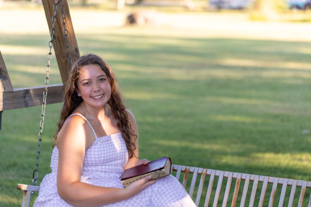 high school senior girl photo holding bible